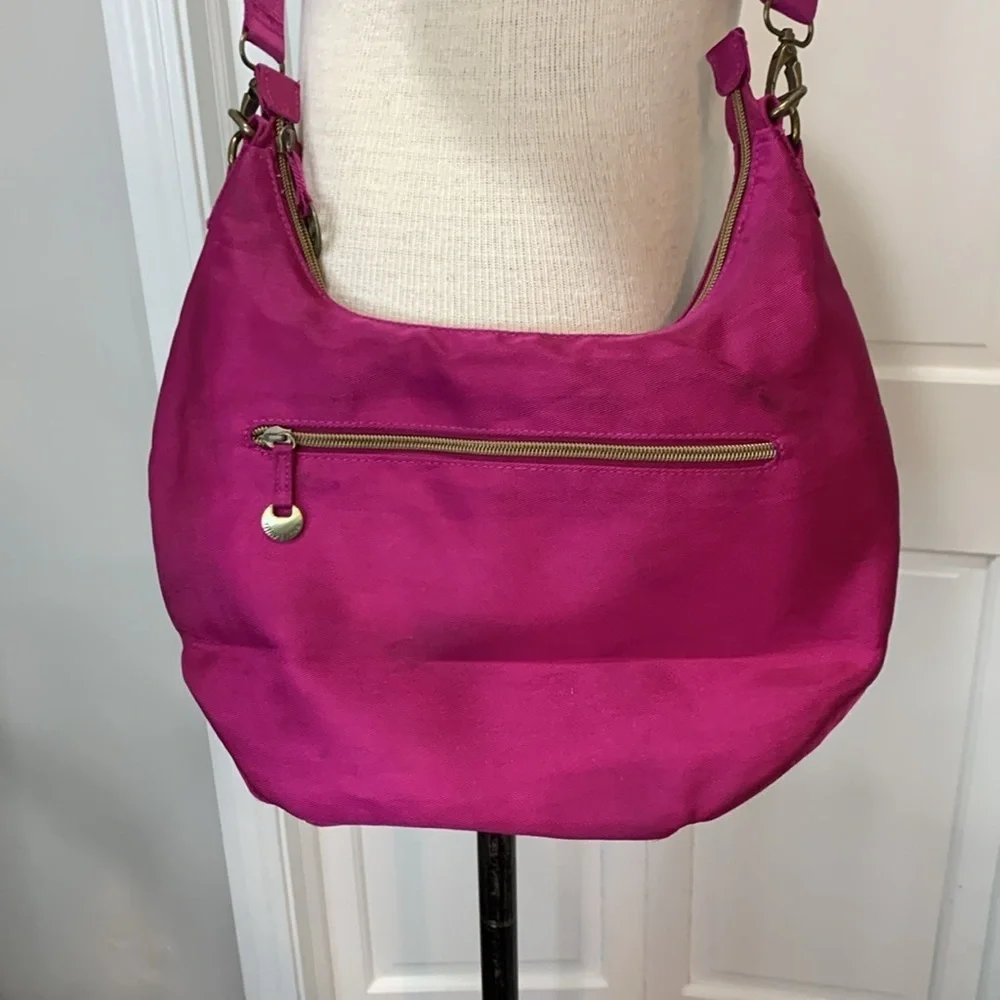Travelon magenta cloth purse withh adjustable strap